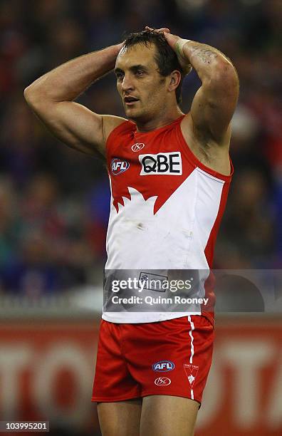 Daniel Bradshaw of the Swans looks dejected after missing a shot on goal during the AFL First Semi Final match between the Western Bulldogs and the...