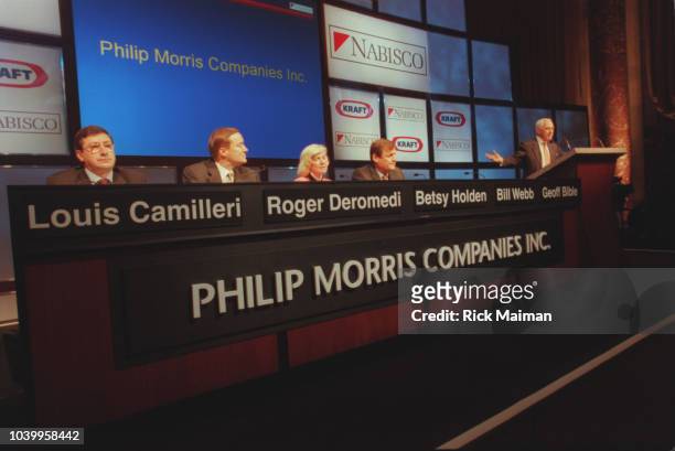 Louis Camilleri, Roger Deromedi, Betsy Holden, Bill Webb and Geoff Bible at the press conference announcing the sale.