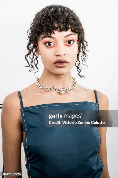 Model prepares backstage before the Afterhomework show as part of the Paris Fashion Week Womenswear Spring/Summer 2019 on September 25, 2018 in...
