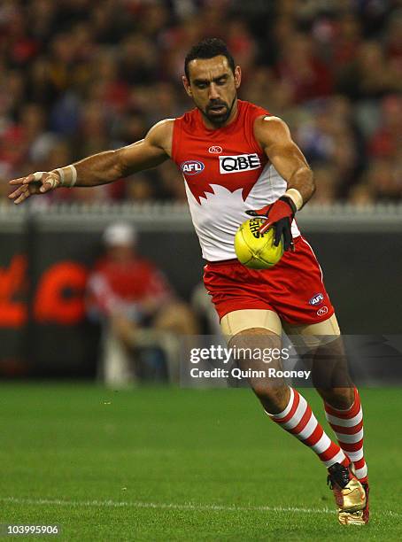 Adam Goodes of the Swans kicks during the AFL First Semi Final match between the Western Bulldogs and the Sydney Swans at Melbourne Cricket Ground on...