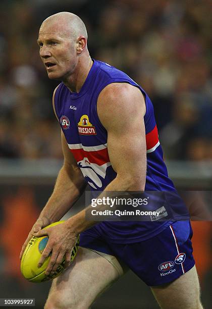 Barry Hall of the Bulldogs kicks during the AFL First Semi Final match between the Western Bulldogs and the Sydney Swans at Melbourne Cricket Ground...