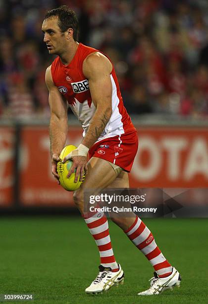 Daniel Bradshaw of the Swans kicks during the AFL First Semi Final match between the Western Bulldogs and the Sydney Swans at Melbourne Cricket...