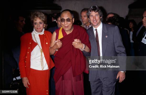 Chief Spiritual Leader of Tibetan Buddhism the Dalai Lama and actor Richard Gere following a press conference at Yale College.