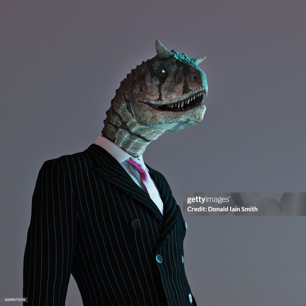 Lizard person in business suit with dinosaur head
