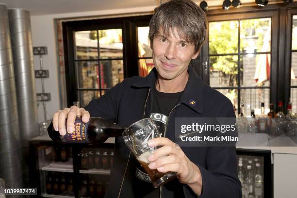 Professor Brian Cox discovers the world of brewing as he launches 'Cosmic Brew' at The Union Club on September 25, 2018 in London, England.