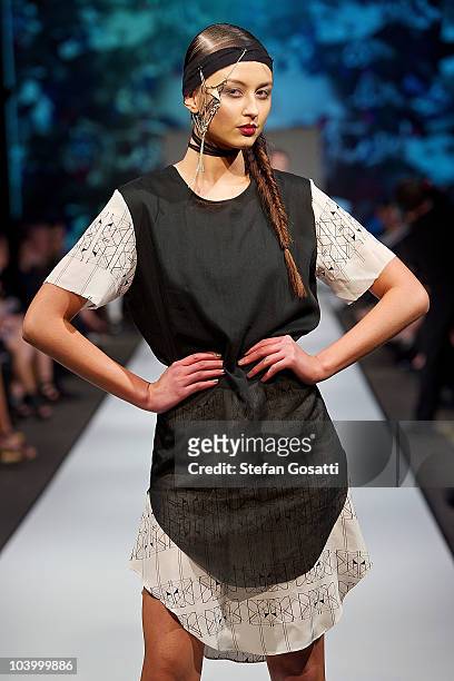 Model showcases designs by Daniella Caputi during the WA Designers Collection 2 catwalk show as part of Perth Fashion Week 2010 at Fashion Paramount...