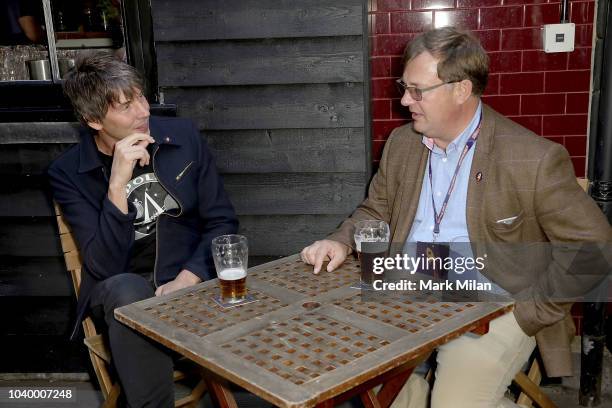 Professor Brian Cox discovers the world of brewing as he launches 'Cosmic Brew' with Michael Lees-Jones at The Union Club on September 25, 2018 in...