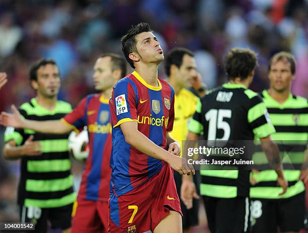 David Villa of Barcelona trudges off the pitch at the end of the La Liga match between Barcelona and Hercules at the Camp Nou stadium on September...