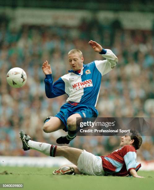 David Batty of Blackburn Rovers is tackled by Matty Holmes of West Ham United during an FA Carling Premiership match at Upton Park on April 30, 1995...