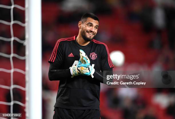 Sergio Romero of Manchester United looks on during the warm up prior to the Carabao Cup Third Round match between Manchester United and Derby County...