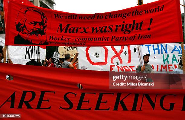 Members of the workers' communist party of Iran march to the Thessaloniki International Fair where Greek Prime Minister George Papandreou delivered a...