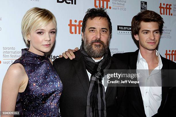 Actress Carry Mulligan, director Mark Romanek and actor Andrew Garfield arrive at the "Never Let Me Go" Premiere held at the Ryerson Theatre during...