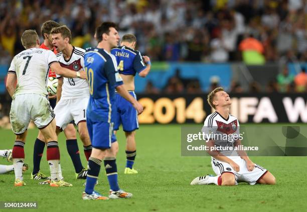 Toni Kroos of Germany celebrates after winning the FIFA World Cup 2014 final soccer match between Germany and Argentina at the Estadio do Maracana in...