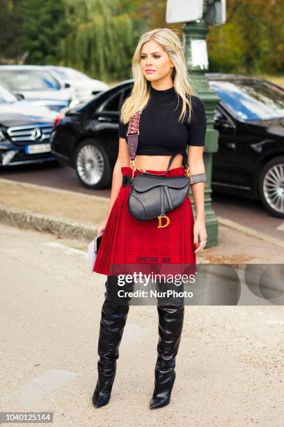 Guest attends the Christian Dior show as part of the Paris Fashion Week Womenswear Spring/Summer 2019 on September 24, 2018 in Paris, France.