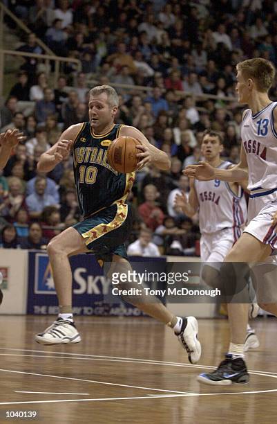 Andrew Gaze for Australia, sprints down the court in the match between the Australian Boomers and Russia, during the Coca-Cola Challenge match played...