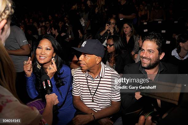 Creative director Kimora Lee Simmons, Russell Simmons, and director Brett Ratner attend the Z Spoke by Zac Posen Spring 2011 fashion show during...