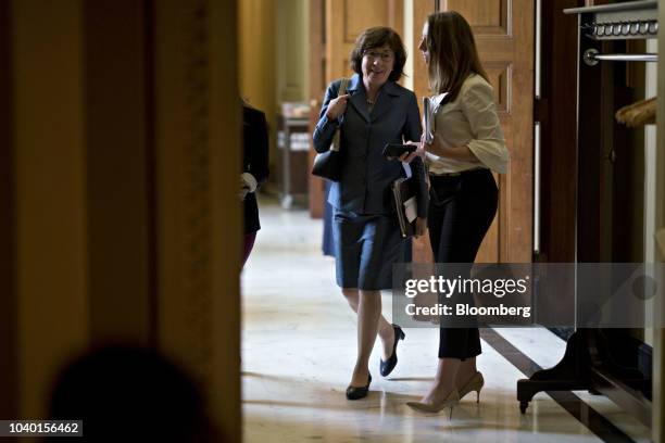 Senator Susan Collins, a Republican from Maine, left, walks out of a weekly caucus meeting at the U.S. Capitol in Washington, D.C., U.S., on Tuesday,...