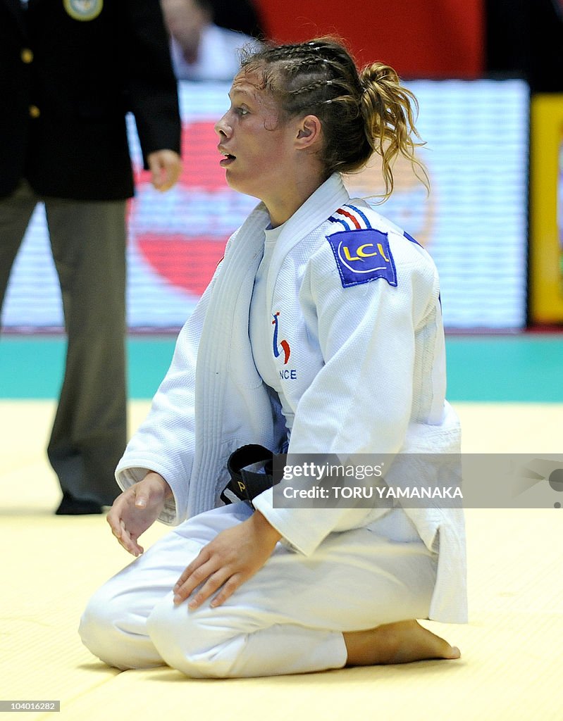 Penelope Bonna of France reacts after he