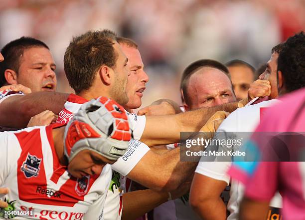 Beau Scott of the Dragons and Anthony Watmough of the Eagles exchange words during the NRL Fourth Qualifying Final match between the St George...