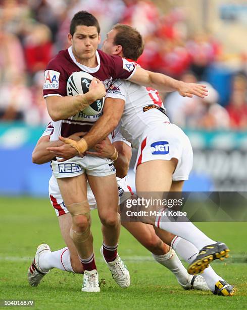 Ben Farrar of the Eagles is tackled during the NRL Fourth Qualifying Final match between the St George Illawarra Dragons and the Manly Warringah Sea...