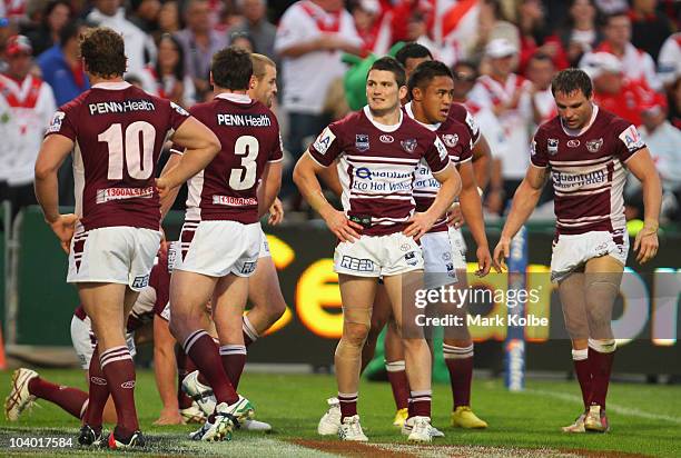 The Eagles stand dejected behind the goal line after a Dragons try during the NRL Fourth Qualifying Final match between the St George Illawarra...