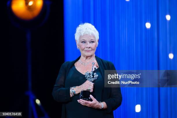 Actress Judi Dench receives the Donostia Award during the 66th San Sebastian International Film Festival at the Kursaal Palace on September 25, 2018...