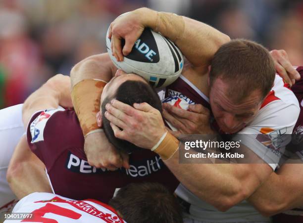 Ben Farah of the Eagles is tackled during the NRL Fourth Qualifying Final match between the St George Illawarra Dragons and the Manly Warringah Sea...