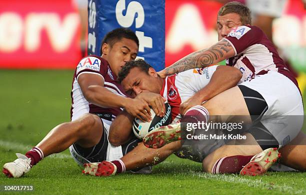 Neville Costigan of the Dragons is held up over the try line and deied a try during the NRL Fourth Qualifying Final match between the St George...