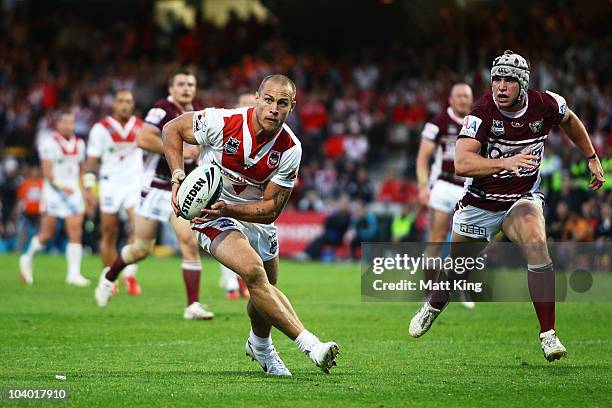 Matt Cooper of the Dragons runs towards the line to score his first try during the NRL Fourth Qualifying Final match between the St George Illawarra...
