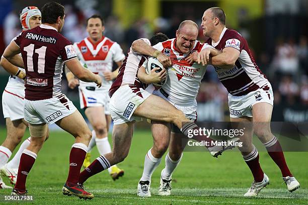 Michael Weyman of the Dragons takes on the defence during the NRL Fourth Qualifying Final match between the St George Illawarra Dragons and the Manly...