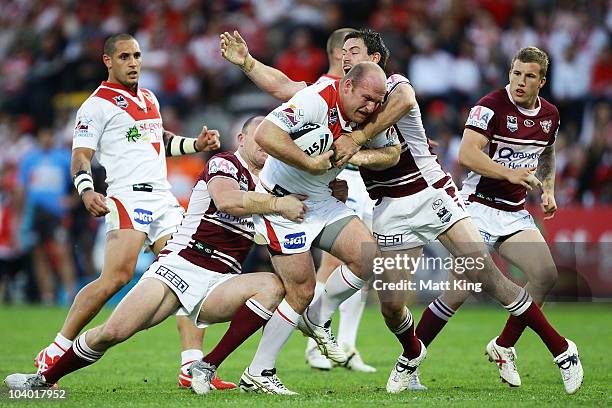 Michael Weyman of the Dragons takes on the defence during the NRL Fourth Qualifying Final match between the St George Illawarra Dragons and the Manly...