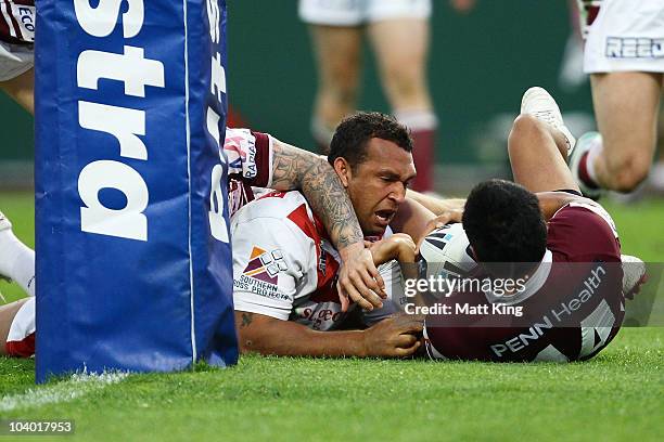 Neville Costigan of the Dragons loses the ball over the line during the NRL Fourth Qualifying Final match between the St George Illawarra Dragons and...