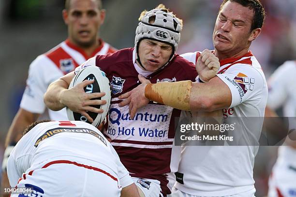 Jamie Buhrer of the Sea Eagles takes on the defence during the NRL Fourth Qualifying Final match between the St George Illawarra Dragons and the...