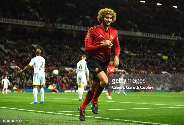Marouane Fellaini of Manchester United celebrates after scoring his team's second goal during the Carabao Cup Third Round match between Manchester...