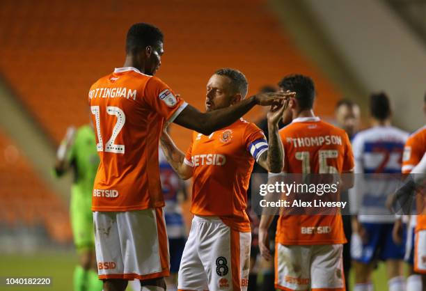 Jay Spearing and Michael Nottingham of Blackpool celebrate after the Carabao Cup Third Round match between Blackpool and Queens Park Rangers at...