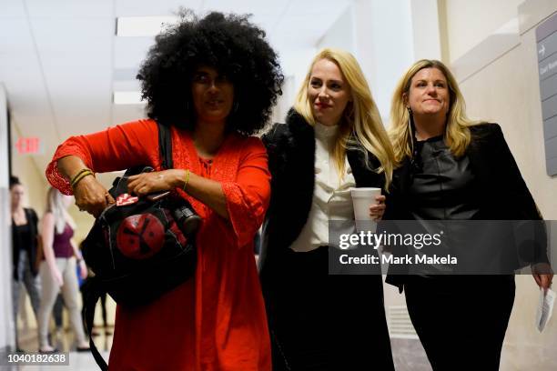 Bill Cosby accuser Lili Bernard and grief counselor Caroline Heldman react after he was sentenced to 3-10 years in the assault retrial at the...