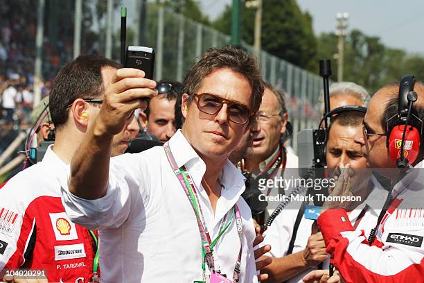 Actor Hugh Grant is seen on the grid before the Italian Formula One Grand Prix at the Autodromo Nazionale di Monza on September 12, 2010 in Monza,...