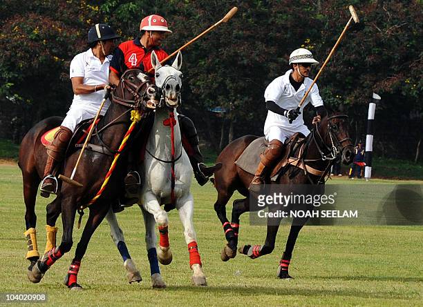 Indian polo players compete in the Prince Berar Polo Cup final in Hyderabad on September 12, 2010. The Hyderabad polo season runs September 9-23. AFP...