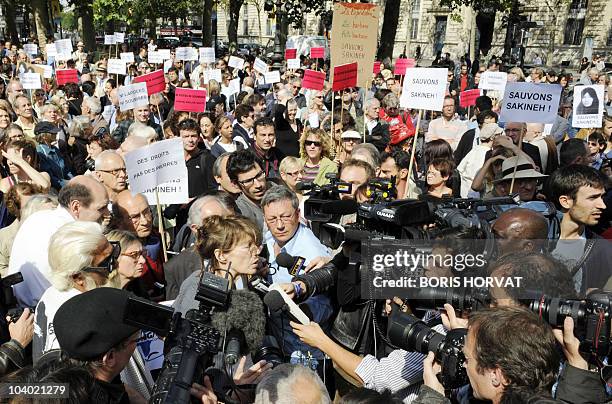 Franco-British actress Jane Birkin speaks to journalists during a demonstration on September 12, 2010 at the Republique Square in Paris, in support...