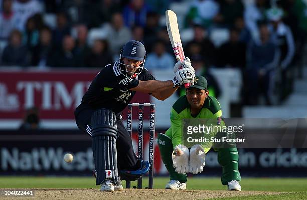 England captain Andrew Strauss picks up some runs watched by Kamran Akmal during the 2nd NatWest ODI match between England and Pakistan at Headingley...