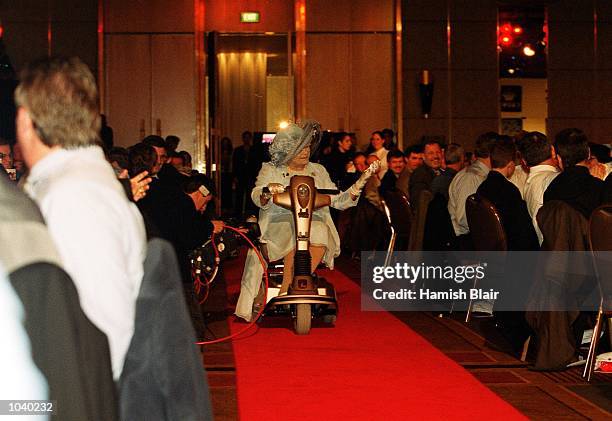 The Queen Mother played by Gerry Connolly enters the Crown Casino during the North Melbourne Breakfast at the Crown Casino prior to the AFL grand...