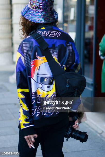 Guest in the streets of Paris, during Paris Fashion Week Womenswear Spring/Summer 2019, on September 25, 2018 in Paris, France.