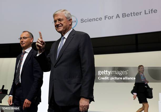 Werner Baumann, CEO of Bayer AG, with Werner Wenning , the chairman of the board of directors, at the company's general meeting in Bonn, Germany, 28...