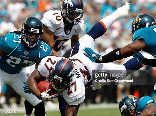 Knowshon Moreno of the Denver Broncos dives for a firstdown during the NFL season opener game against the Jacksonville Jaguars at EverBank Field on...