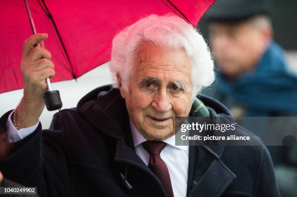 Witness William Glied arrives to the trial against former Auschwitz guard Reinhold Hanning in Detmold, Germany, 18 February 2016. The 94-year-old man...