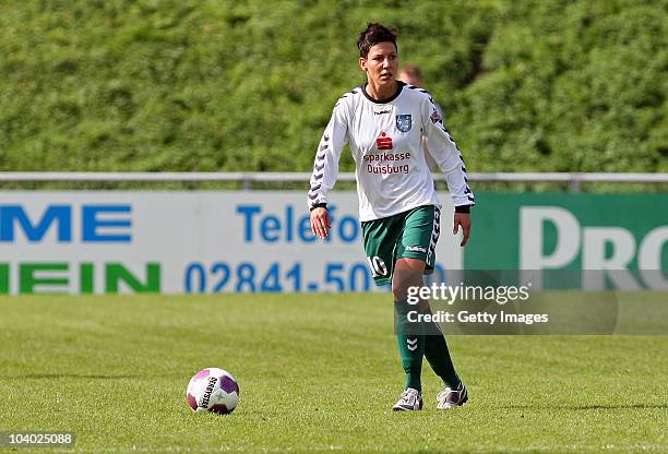 Linda Bresonik of Duisburg runs with the ball during the Women's bundesliga match between FCR Duisburg and FFC Frankfurt at the PCC-Stadium on...