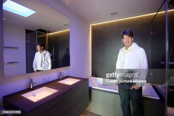 Xing founder and building contractor of the 'Apartimentum,' Lars Hinrichs, stands in the bathroom of 260-square-meter apartment where the bathwater...