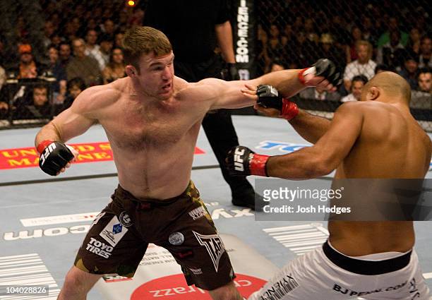 Matt Hughes punches BJ Penn at UFC 63 at the Arrowhead Pond on September 23, 2006 in Anaheim, California.