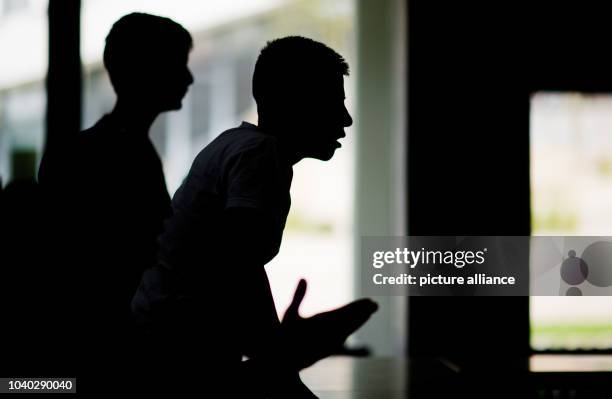 Young refugees attend language classes during the integration project 'FuNah' at the university of Hildesheim, Germany, 19 August 2015. The refugee...