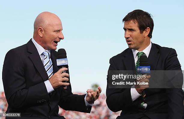 Channel Nine commentators Peter Sterling and Andrew Johns speak during their pre-match show on the sideline before the NRL Fourth Qualifying Final...
